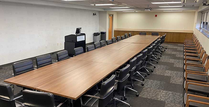 Standard Board Room with long table and chairs along each side